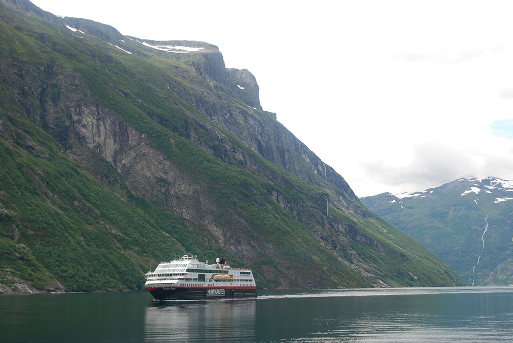 The Geirangerfjord with a coastal express ship, Norway