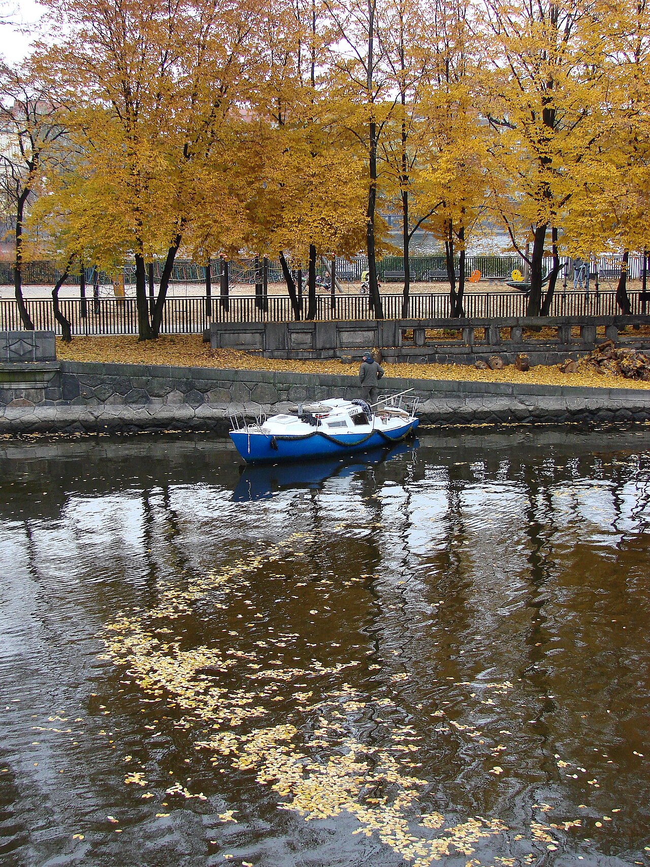 A boat at the locks on the Vltava river in Prague